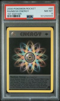 PSA 8 - Pokemon Card - Team Rocket 80/82 - RAINBOW ENERGY (rare) *1st Edition* - NM-MT